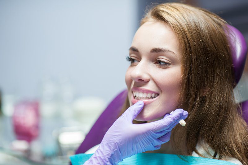 woman patient getting dental crowns in Richardson