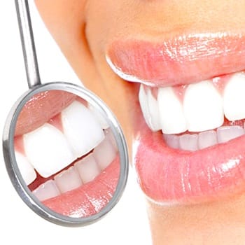 mirror reflection of a beautiful white smile - Richardson & North Dallas TX