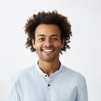 Man showing off beautiful white smile - Dental Check ups and cleanings in Dallas, TX