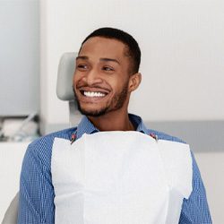 Man Smiling at Cosmetic Dentistry Dentakl office - Dallas, TX