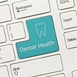 Dental Health button on a computers keyboard - Schedule today at Shwarts Family Dentistry