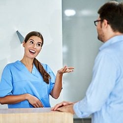 Patient consulting with Emergency Dentist
