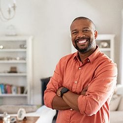Man smiling about affordable dental implants in Dallas, TX