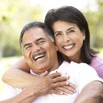 couple smiling together after finding cosmetic dentistry in Dallas.