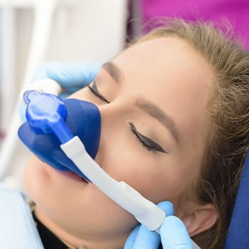 Woman Sedated for dental procedure Dallas, TX