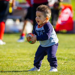 Little boy playing sports